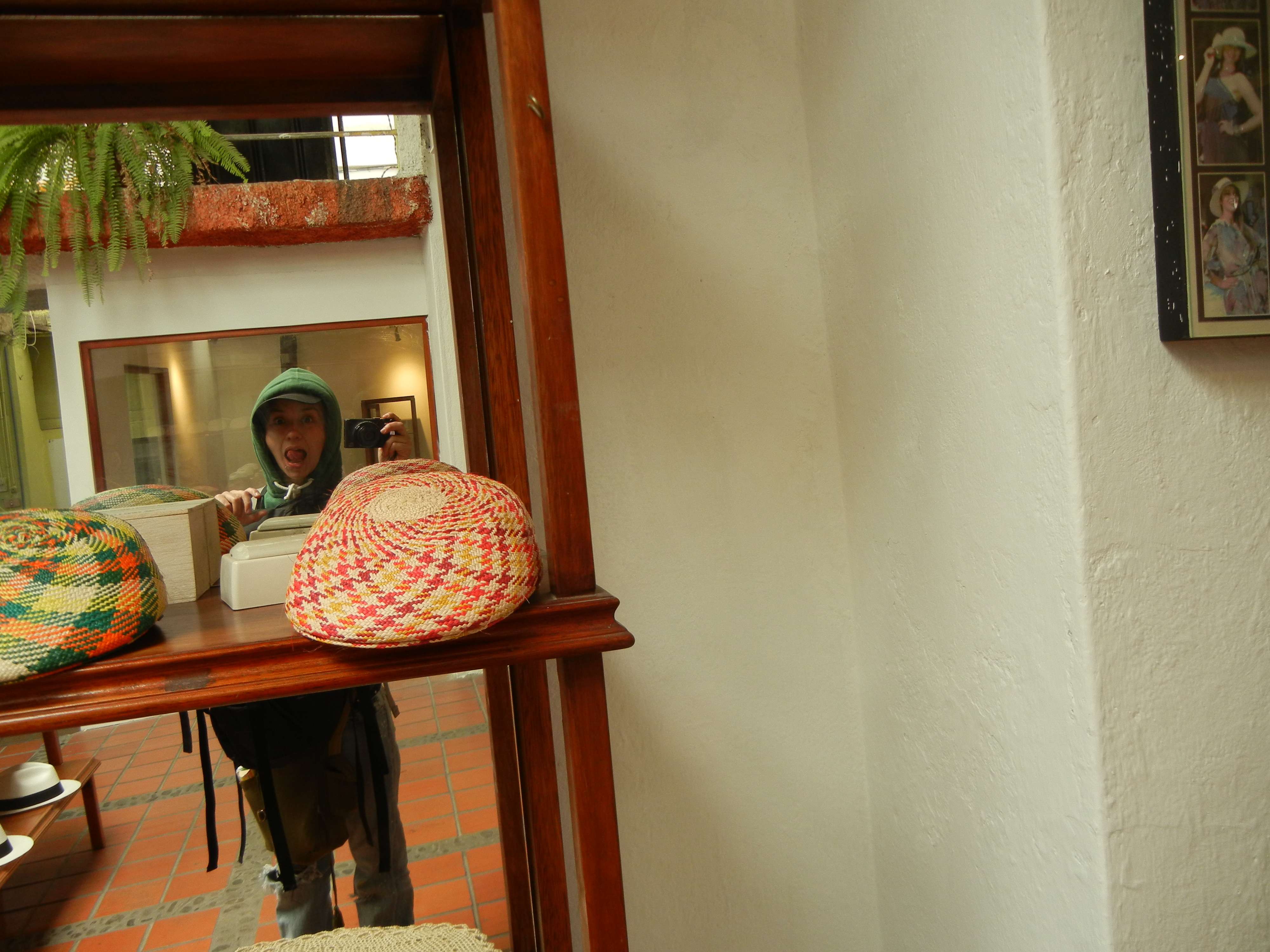 Paula in a mirror at the Panama Hat Museum