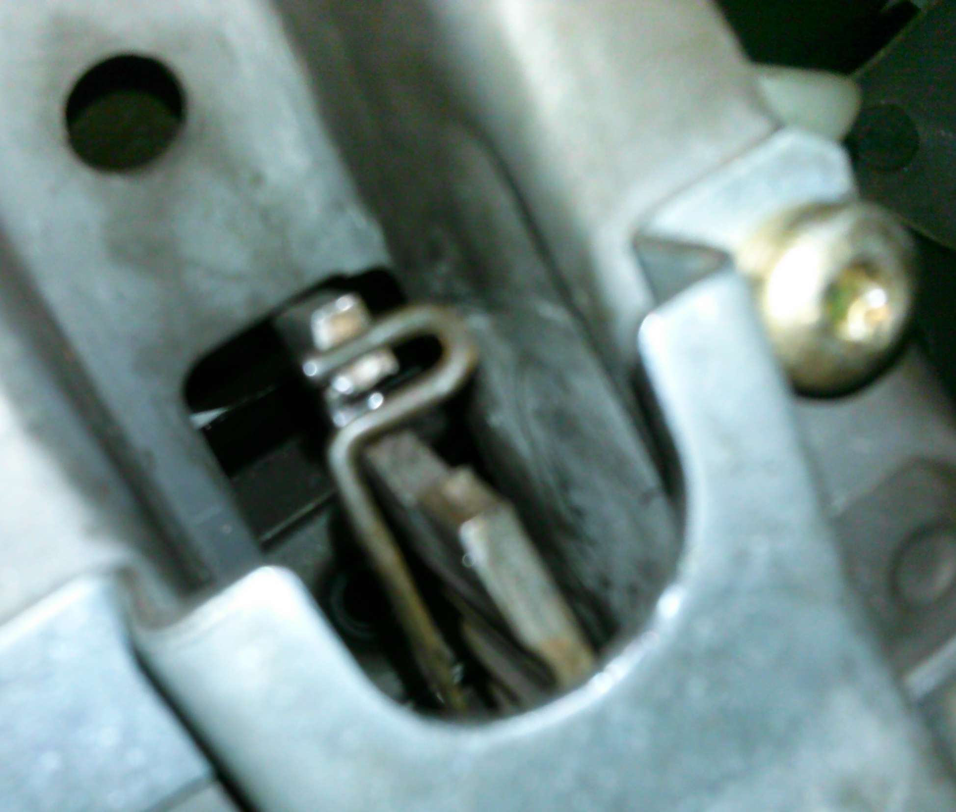 A picture of the clutch pedal hook and clip